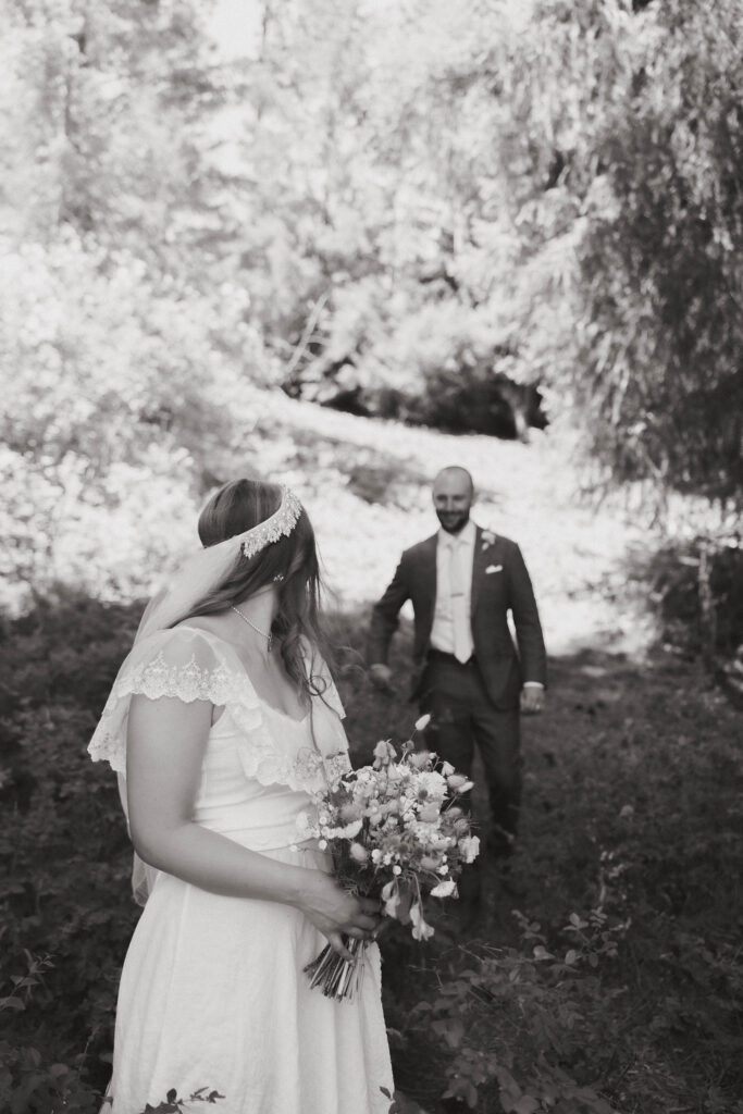 vintage bride and groom in the forest black and white bridal photography.