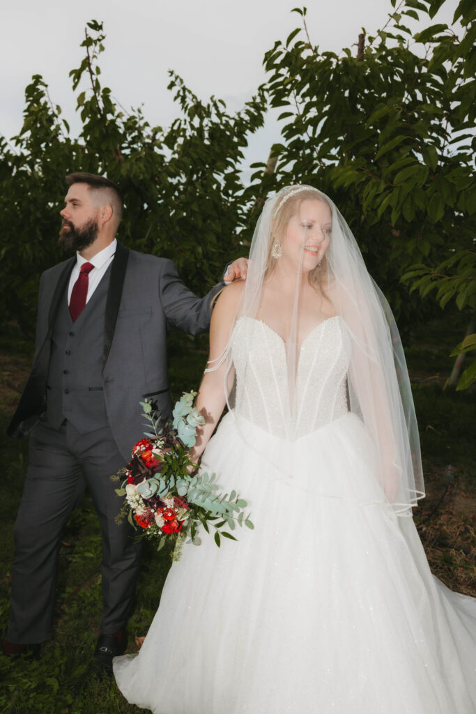 editorial bride and groom photos in an orchard