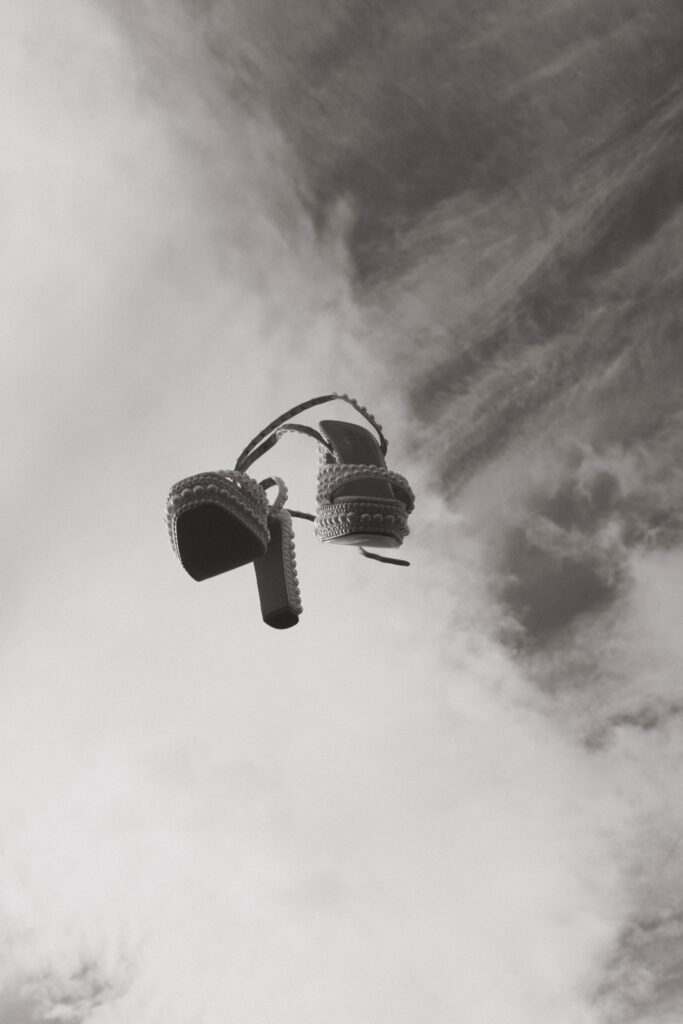 editorial wedding shoes in the air